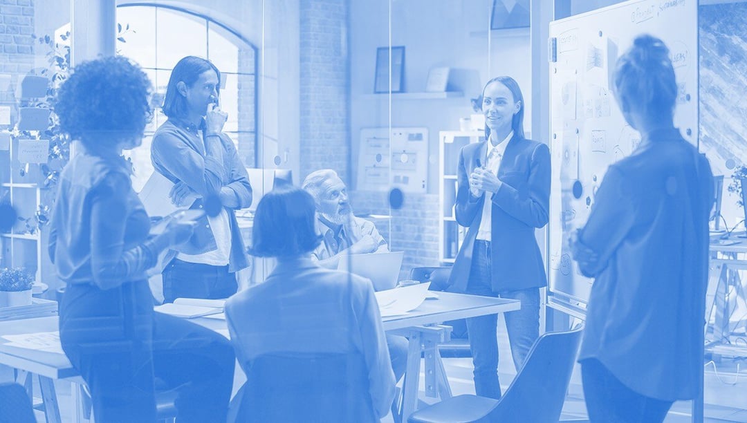 Brand management team brainstorming ideas in an office
