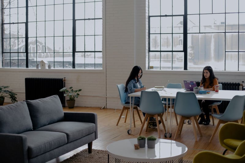 Copperwing creative marketing team members collaborating in an office-1
