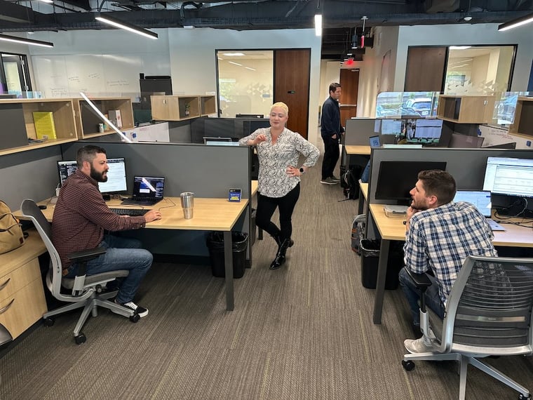 Dallas office in Texas of Ziflow with employees friendly chatting