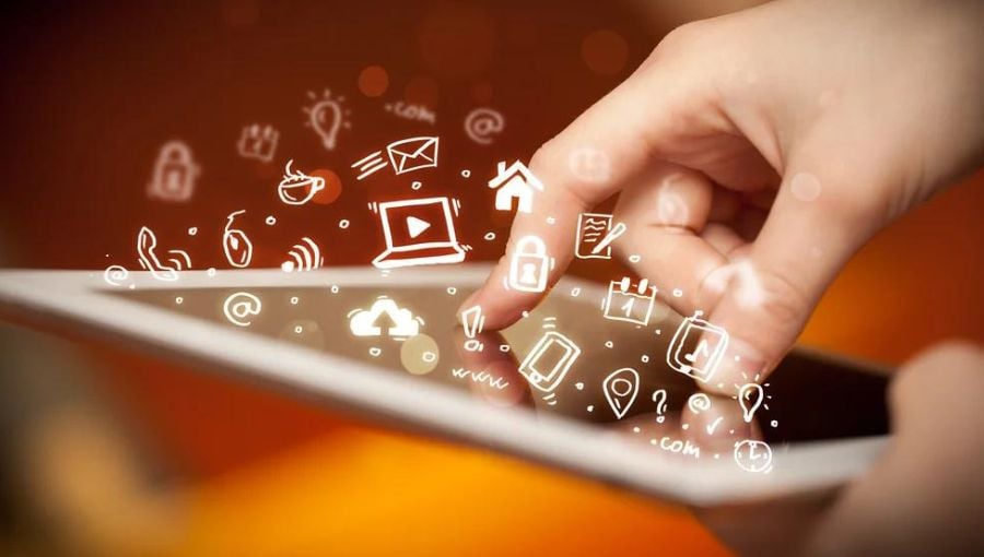 Hand touching tablet pc, social media concept icons - 52 content marketing statistics (with key takeaways)