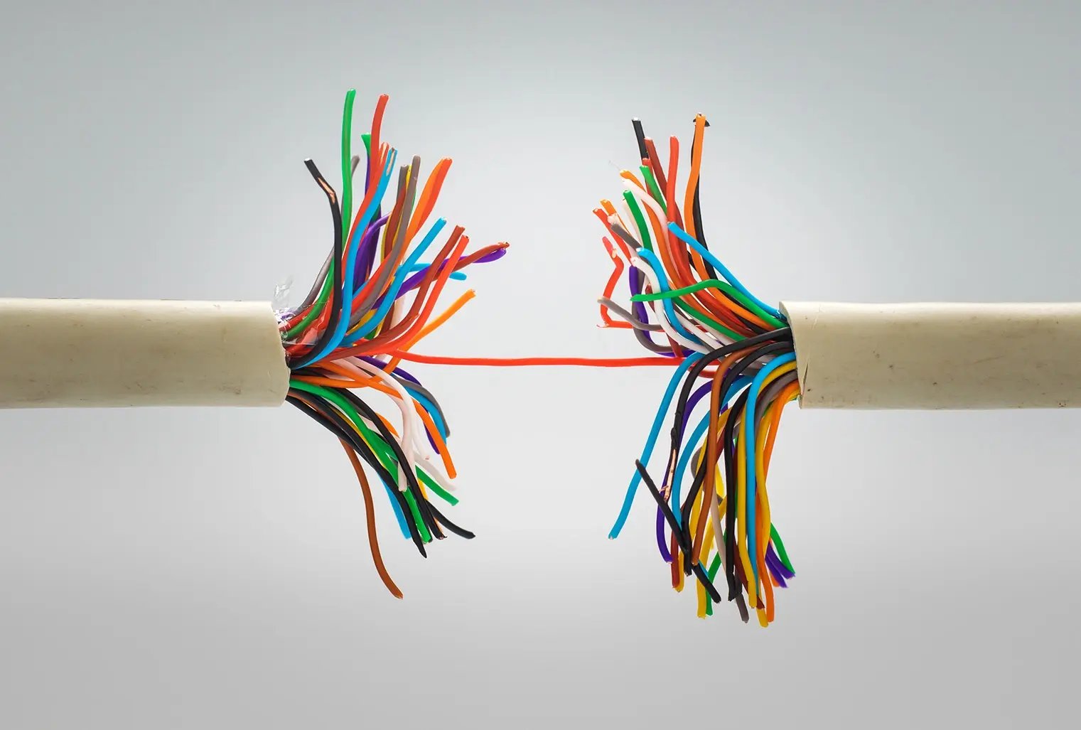 torn cables with the last one holding on to the tip