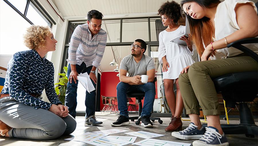 Group of marketers brainstorming in a creative process
